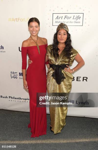 Tinamarie Clark and Luxury Auction Chair, composer Chloe Flower attend "Midnight At The Oasis" Annual Art For Life Benefit hosted by Russell Simmons'...