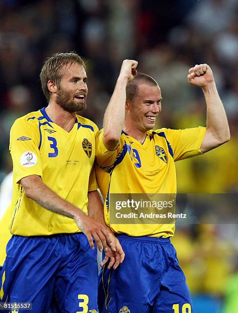 Olof Mellberg and Daniel Andersson of Sweden celebrate victory after the UEFA EURO 2008 Group D match between Greece and Sweden at Stadion...