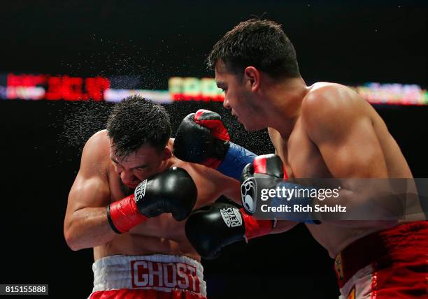 Omar Figueroa Jr., right, connects with a right punch to the face of Robert Guerrero during the third round of their Welterweight fight at Nassau...