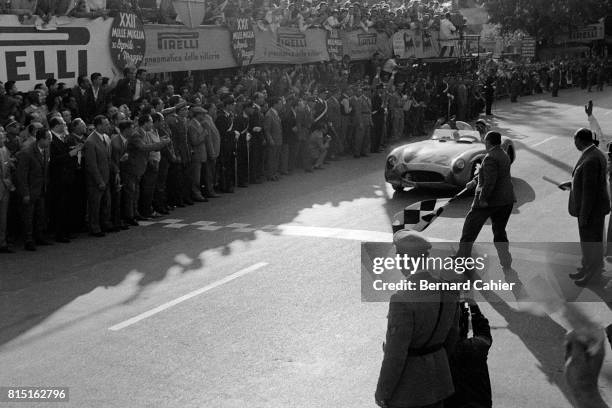 Stirling Moss, Dennis Jenkinson, Mercedes 300 SLR, Mille Miglia, Italy, May 1, 1955. Stirling Moss and Dennis Jenkinson winning the Mille Miglia.