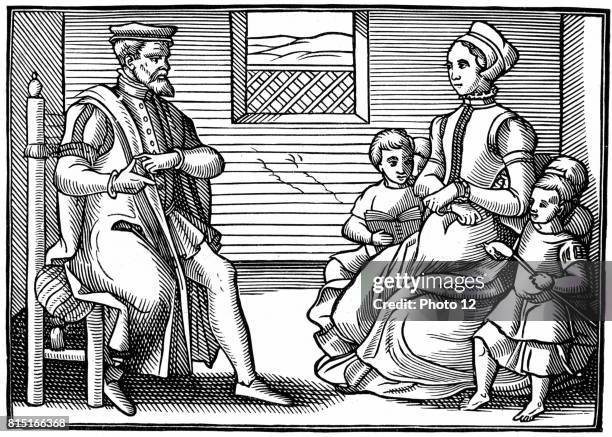 Puritan Family. Father teaching his family to sing Psalms rather than "vayne and tryflying ballades". From the position of his hands it seems he is...