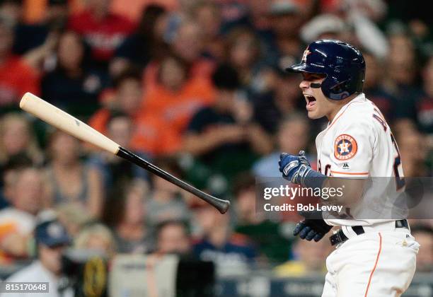 Jose Altuve of the Houston Astros is hit by a pitch in the ninth inning by ]Brandon Kintzler of the Minnesota Twins at Minute Maid Park on July 15,...