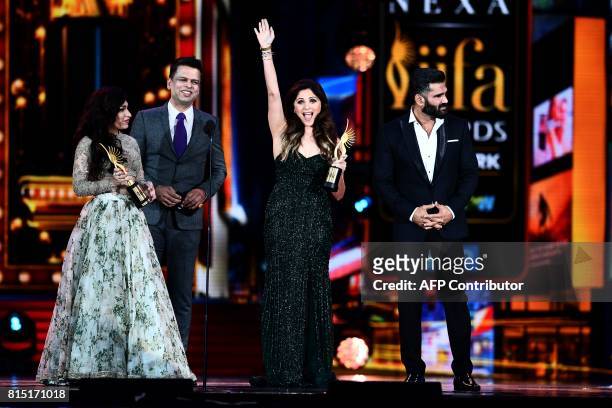 Winners of Best Playback Singer - Female, Kanika Kapoor for "Da Da Dasse" from movie "Udta Punja" and Tulsi Kumar for "Soch Na Sake" from movie...