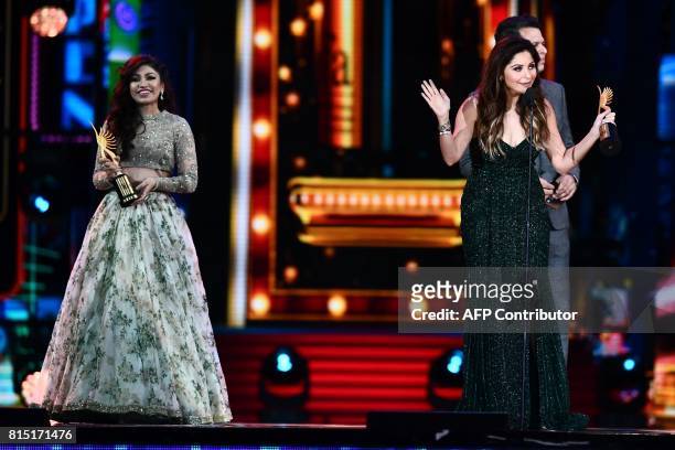Winners of Best Playback Singer - Female, Kanika Kapoor for "Da Da Dasse" from movie "Udta Punja" and Tulsi Kumar for "Soch Na Sake" from movie...