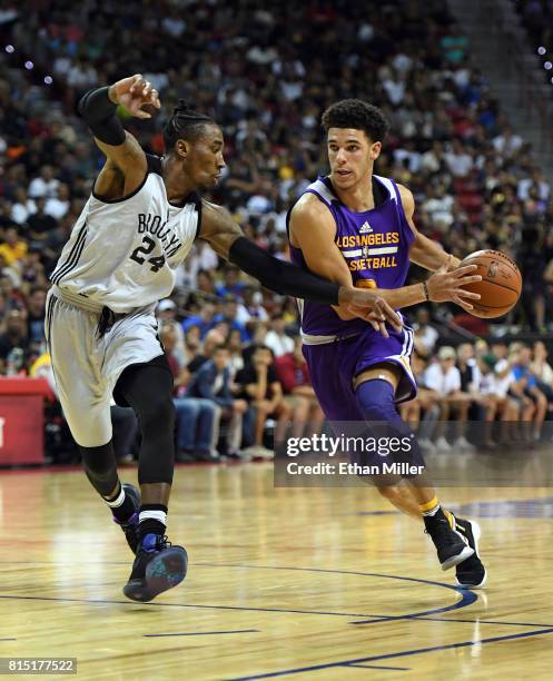 Lonzo Ball of the Los Angeles Lakers drives against Rondae Hollis-Jefferson of the Brooklyn Nets during the 2017 Summer League at the Thomas & Mack...