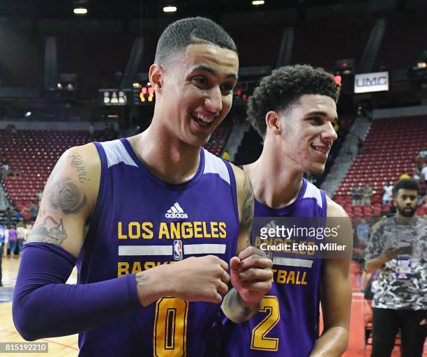 Kyle Kuzma and Lonzo Ball of the Los Angeles Lakers walk off the court after the team's 115-106 win over the Brooklyn Nets during the 2017 Summer...