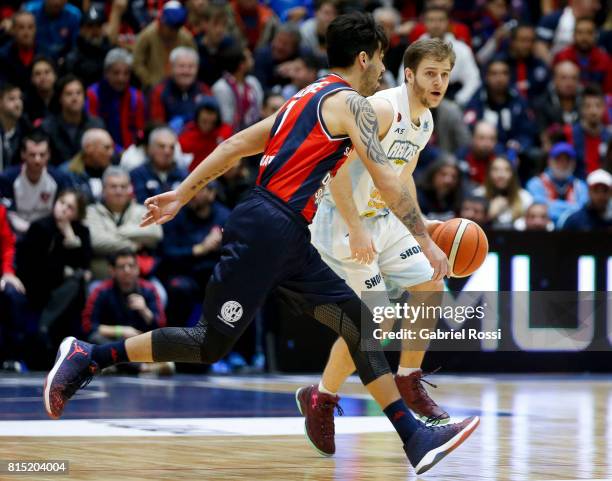 Santiago Vidal of Regatas fights for the ball with Nicolas Aguirre of San Lorenzo during the fifth game between San Lorenzo and Regatas as part of...