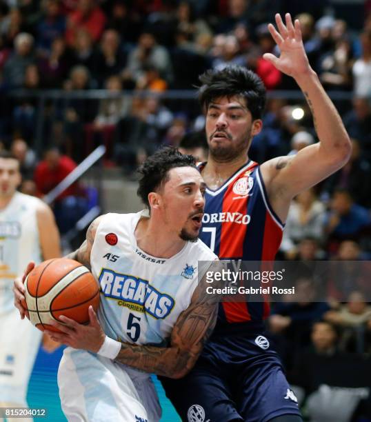 Donald Sims of Regatas fights for the ball with Nicolas Aguirre of San Lorenzo during the fifth game between San Lorenzo and Regatas as part of LNB...