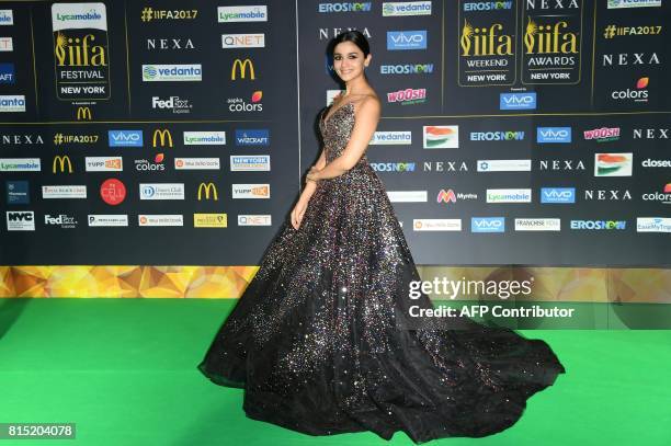 Bollywood actress Alia Bhat poses as she arrives for the IIFA Awards July 15, 2017 at the MetLife Stadium in East Rutherford, New Jersey during the...