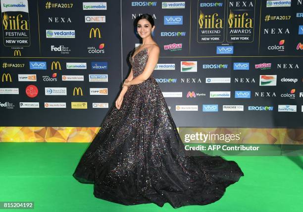 Bollywood actress Alia Bhat poses as she arrives for the IIFA Awards July 15, 2017 at the MetLife Stadium in East Rutherford, New Jersey during the...