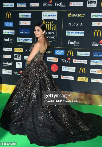 Bollywood actress Alia Bhat poses as she arrives for the IIFA Awards July 15, 2017 at the MetLife Stadium in East Rutherford, New Jersey during the...