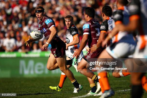 Tom Trbojevic of the Sea Eagles makes a break the round 19 NRL match between the Manly Sea Eagles and the Wests Tigers at Lottoland on July 16, 2017...