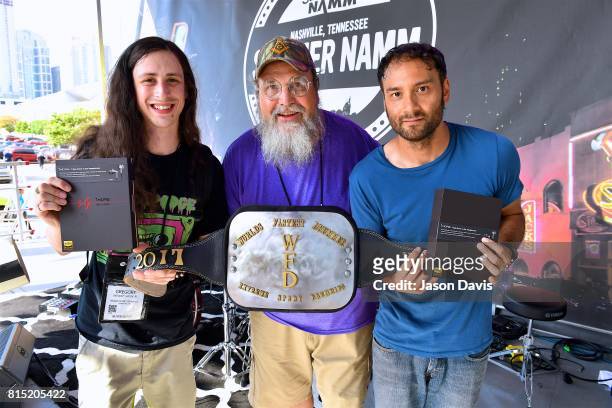World's Fastest Drummer Gregory Snook Jr, World's Fastest drummer competition creator Boo McAfee and World's Fastest Drummer Ikaika Pekeloa poser on...