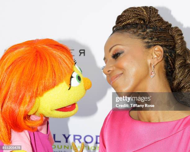 Host Holly Robinson Peete and the first autistic Sesame Street character, Julia, at HollyRod Foundation's DesignCare Gala on July 15, 2017 in Pacific...