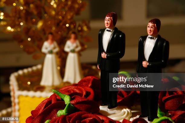 Same-sex wedding cake topper figurines are seen at Cake and Art cake decorators June 10, 2008 in West Hollywood, California. Business is increasing...