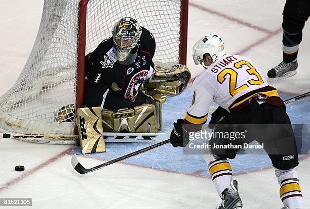 John Curry of the Wilkes-Barre/Scranton Penguins makes a save on a shot by Colin Stuart of the Chicago Wolves during the Calder Cup Finals on June...