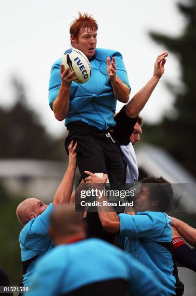 Jay Williams competes against his brother Ali Williams in a lineout during a New Zealand All Blacks training session at Trusts Stadium on June 11,...