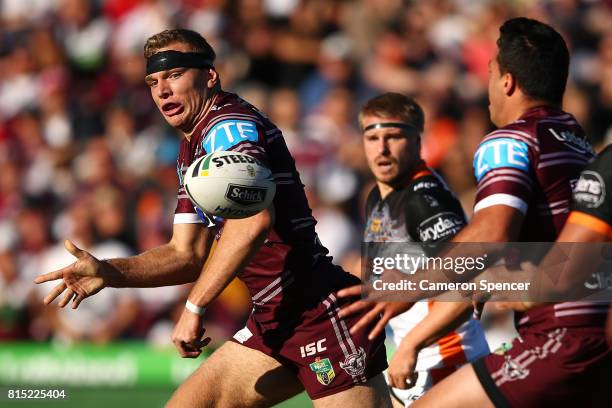 Tom Trbojevic of the Sea Eagles passes the ball during the round 19 NRL match between the Manly Sea Eagles and the Wests Tigers at Lottoland on July...