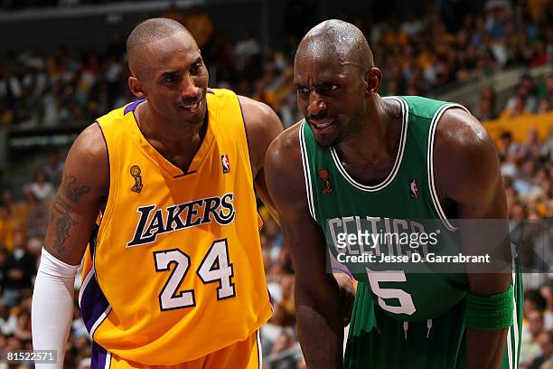 Kobe Bryant of the Los Angeles Lakers talks to Kevin Garnett of the Boston Celtics in Game Three of the 2008 NBA Finals on June 10, 2008 at Staples...