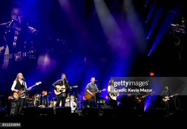 Timothy B. Schmit, Vince Gill, Don Henley, Deacon Frey, Joe Walsh and Stuart Smith perform onstage with The Eagles during The Classic West at Dodger...