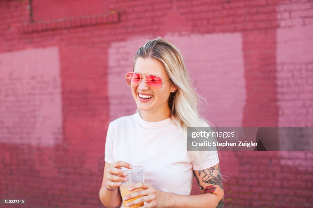 Young woman drinking juice