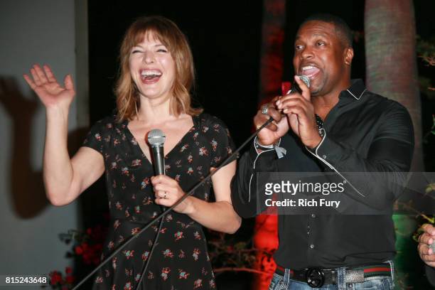 Actors Milla Jovovich and Chris Tucker attend Cinespia Presents "The Fifth Element" at Hollywood Forever on July 15, 2017 in Hollywood, California.