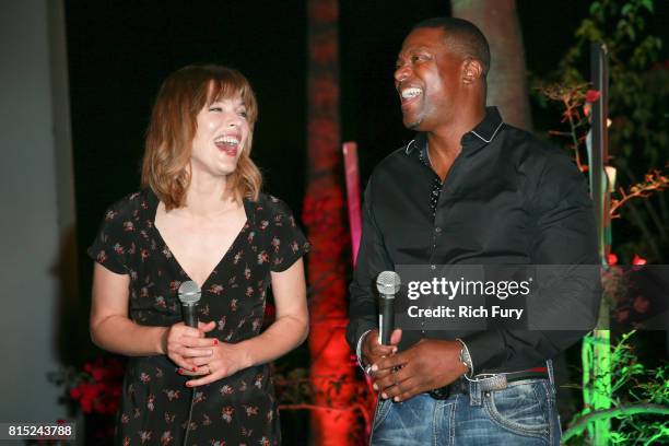 Actors Milla Jovovich and Chris Tucker attend Cinespia Presents "The Fifth Element" at Hollywood Forever on July 15, 2017 in Hollywood, California.