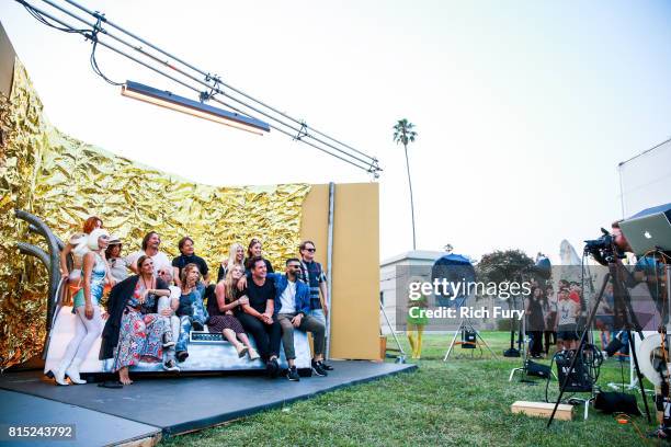 Guests pose in a photo booth at Cinespia Presents "The Fifth Element" at Hollywood Forever on July 15, 2017 in Hollywood, California.