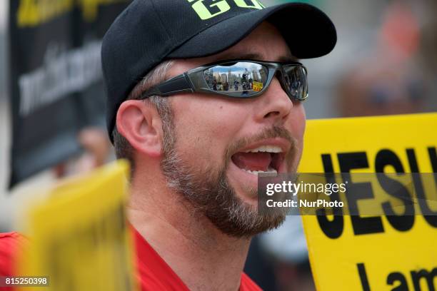 Controversial religion group led by 'Pastor Aden' holds a counter protest on the sidelines of a Anti-Trump Refuse Racism rally, in Philadelphia,...