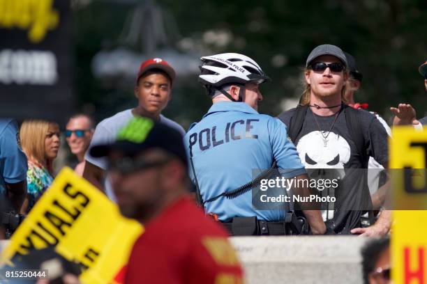 Controversial religion group led by 'Pastor Aden' holds a counter protest on the sidelines of a Anti-Trump Refuse Racism rally, in Philadelphia,...