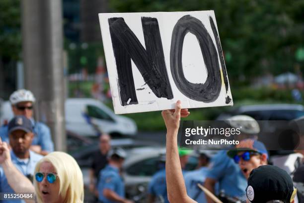 Sign at an anti-Trump Refuse Racism rally in Philadelphia, Pennsylvania, on July 15, 2017.