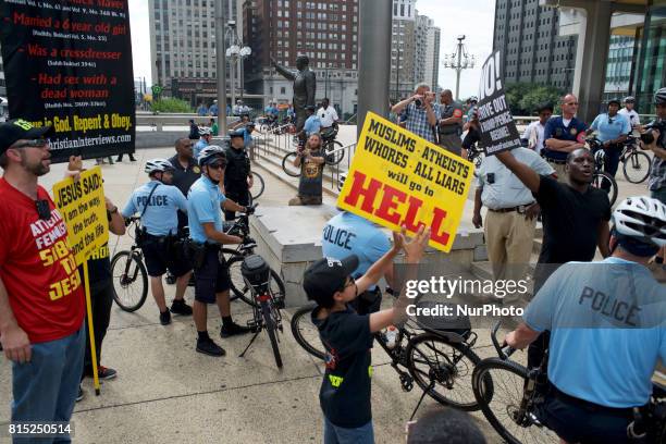 Controversial religion group led by 'Pastor Aden' holds a counter protest on the sidelines of a Anti-Trump Refuse Racism rally, in Philadelphia,...