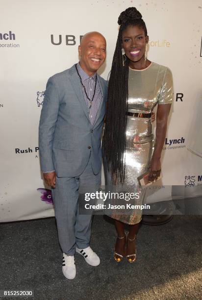 Founder, RUSH Philanthropic Arts Foundation Russell Simmons and Honoree Chief Brand Officer, Uber Bozoma Saint John attend "Midnight At The Oasis"...