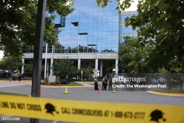 Police officers are seen inside of the National Rifle Association headquarters in Fairfax, Va., during a rally organized by Womens March to denounce...