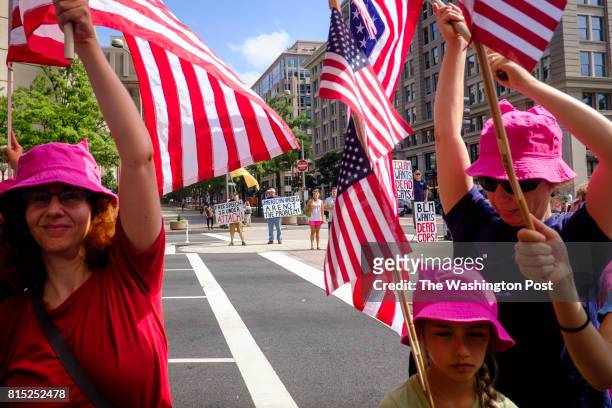 Pro NRA activists take up positions in the median of Pennsylvania Ave. In a counter protest as activists, in response to what they perceive as the...