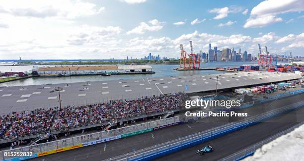 New York City's first ever road race was held in Red Hook, Brooklyn, as Formula E cars, all electric, competed racing around a miniature track with...