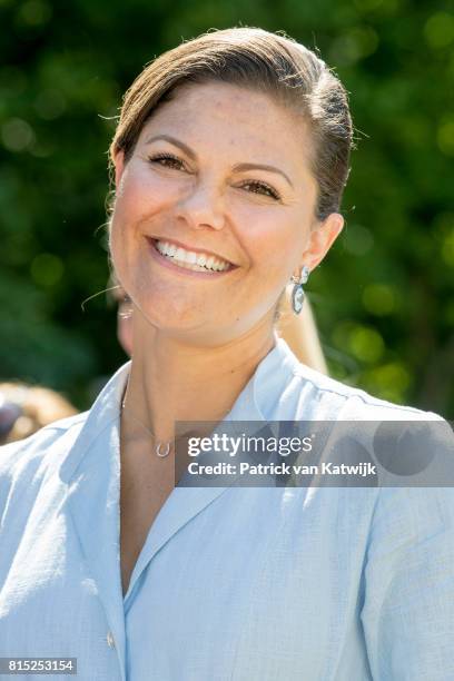 Crown Princess Victoria of Sweden is seen meeting the people gathered in front of Solliden Palace to celebrate the 40th birthday of Crown Princess...