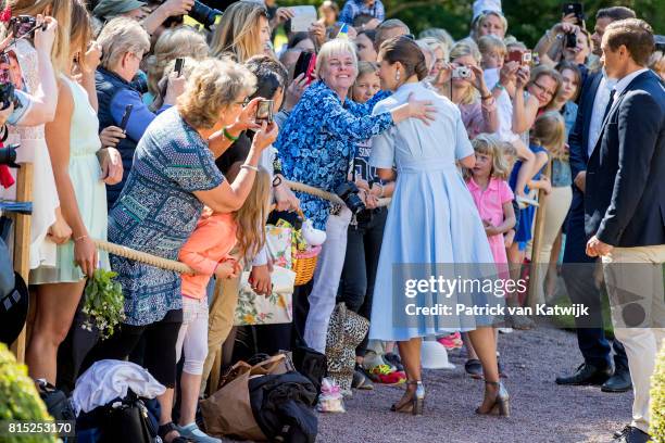 Crown Princess Victoria of Sweden is seen meeting the people gathered in front of Solliden Palace to celebrate the 40th birthday of Crown Princess...