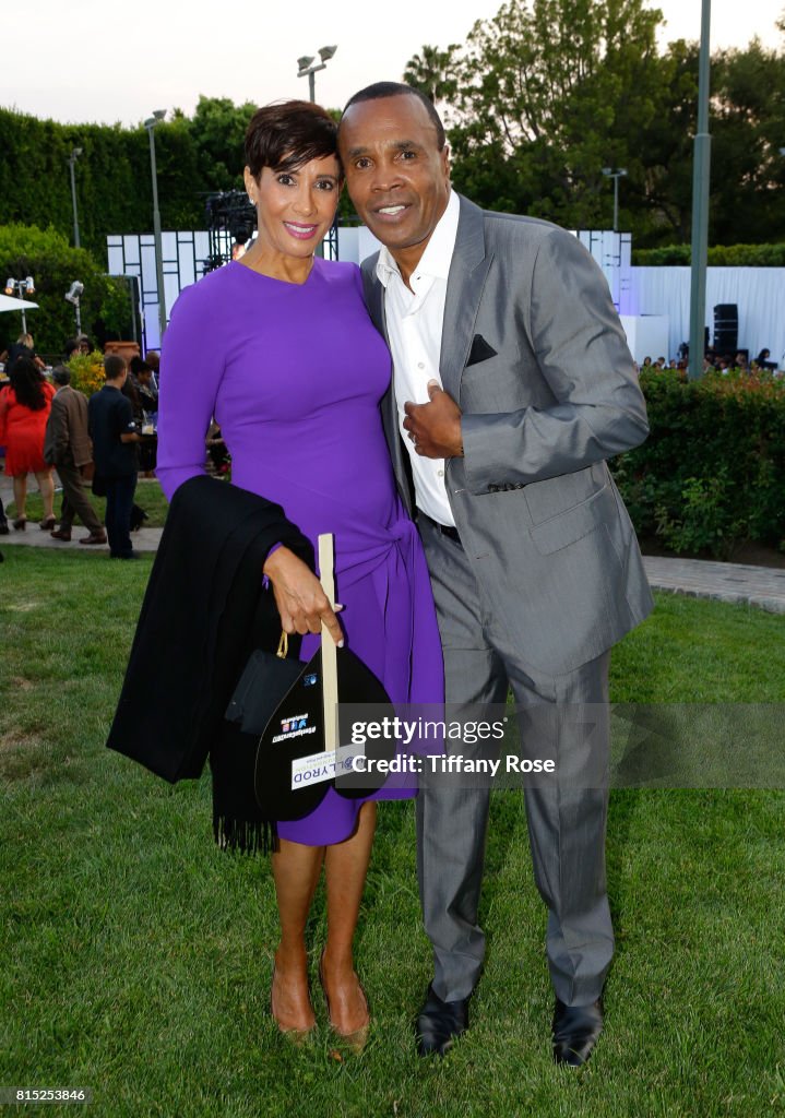 Bernadette Robi and professional boxer Sugar Ray Leonard at HollyRod
