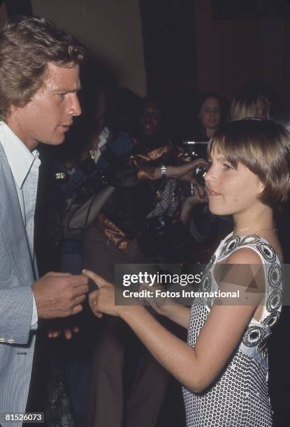 American actor Ryan O'Neal and his daughter, actress Tatum O'Neal, are photographed by paparazzi at a Studio One party in honor of the release of the...