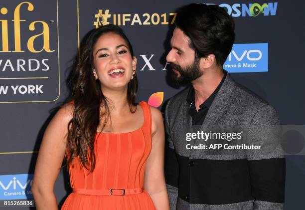 Bollywood actor Shahid Kapoor and wife Mira Rajput arrive for the IIFA Awards July 15, 2017 at the MetLife Stadium in East Rutherford, New Jersey...