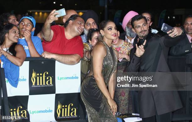 Actors Bipasha Basu and Karan Singh Grover pose with the fans attend the 2017 International Indian Film Academy Festival at MetLife Stadium on July...
