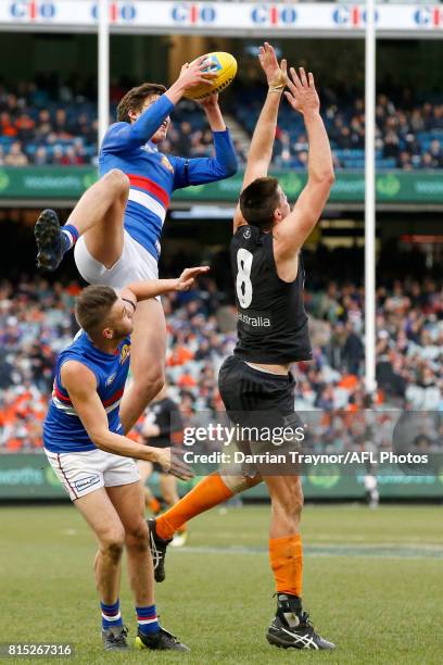 First gamer Lewis Young of the Bulldogs marks the ball during the round 17 AFL match between the Carlton Blues and the Western Bulldogs at Melbourne...