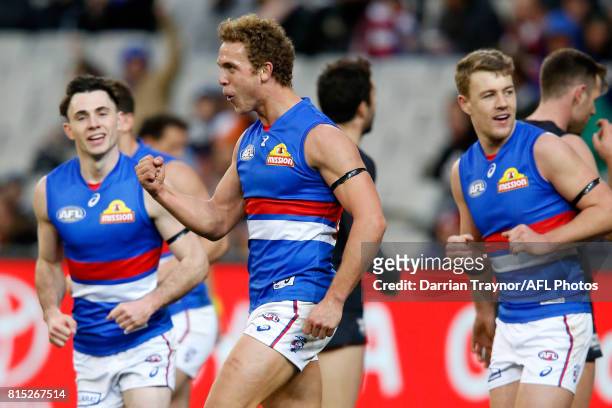 Mitch Wallis of the Bulldogs celebrates a goal during the round 17 AFL match between the Carlton Blues and the Western Bulldogs at Melbourne Cricket...