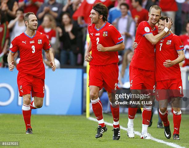 Czech midfielder Libor Sionko celebreates with teammates after scoring during the Euro 2008 Championships Group A football match Czech Republic vs....