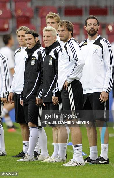 German midfielder Bastian Schweinsteiger and teammates attend a training session on the eve of the match against Croatia on June 11, 2008 in...