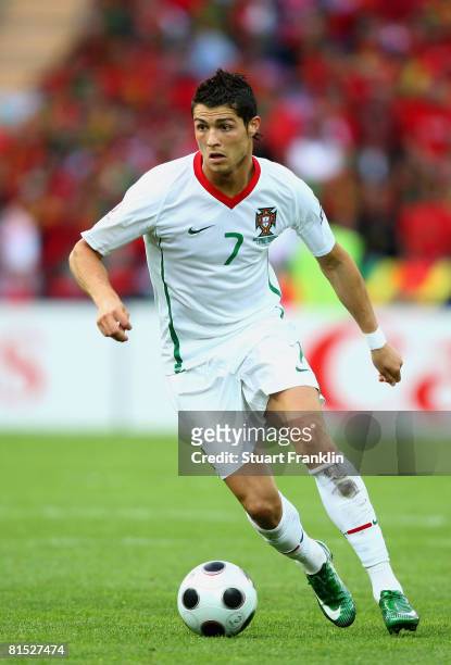 Cristiano Ronaldo of Portugal runs with the ball during the UEFA EURO 2008 Group A match between Czech Republic and Portugal at Stade de Geneve on...