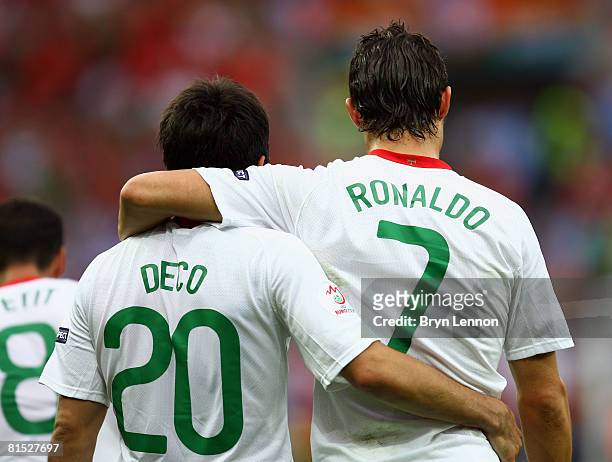 Cristiano Ronaldo of Portugal is congratulated by team mate Deco after scoring his teams second goal during the UEFA EURO 2008 Group A match between...