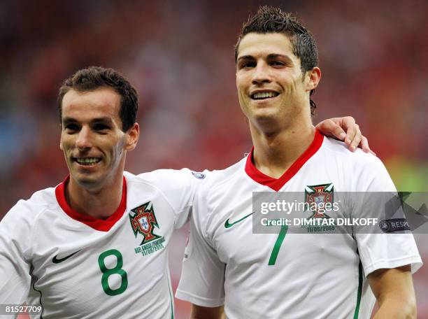 Portuguese forward Cristiano Ronaldo and Portuguese midfielder Petit celebrate after Ronaldo scored during the Euro 2008 Championships Group A...