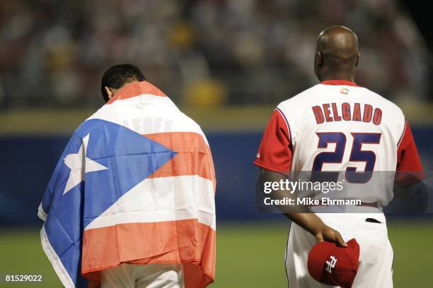 Ricky Ledee and Carlos Delgado of team Puerto Rico during a first round game against team Panama during the 2006 World Baseball Classic at Hiram...